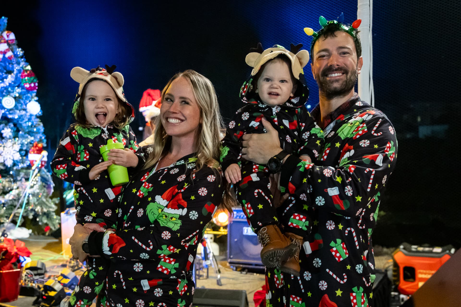 Family in matching holiday pajamas at SnowSide