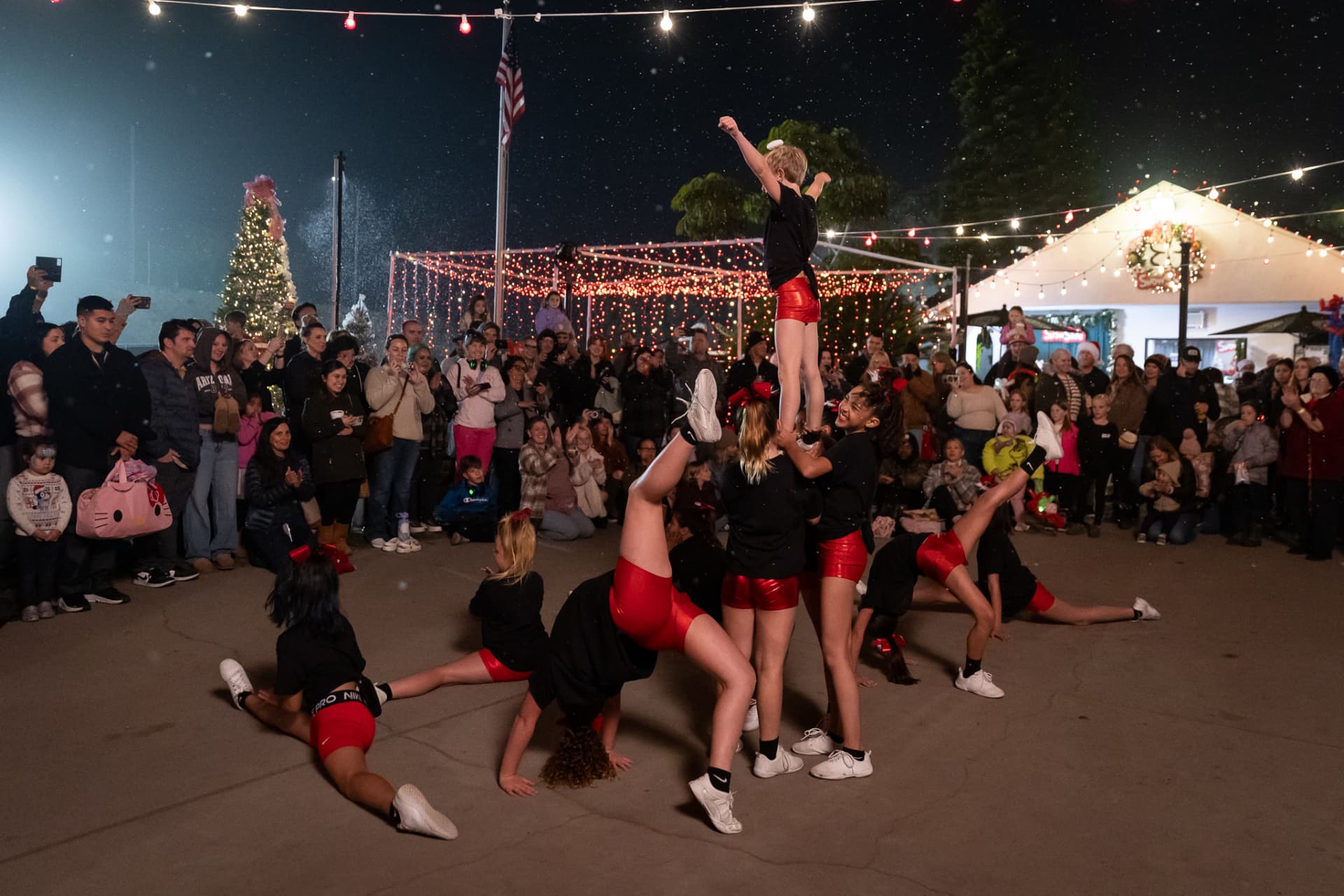 Cheer team performing live for the SnowSide crowd